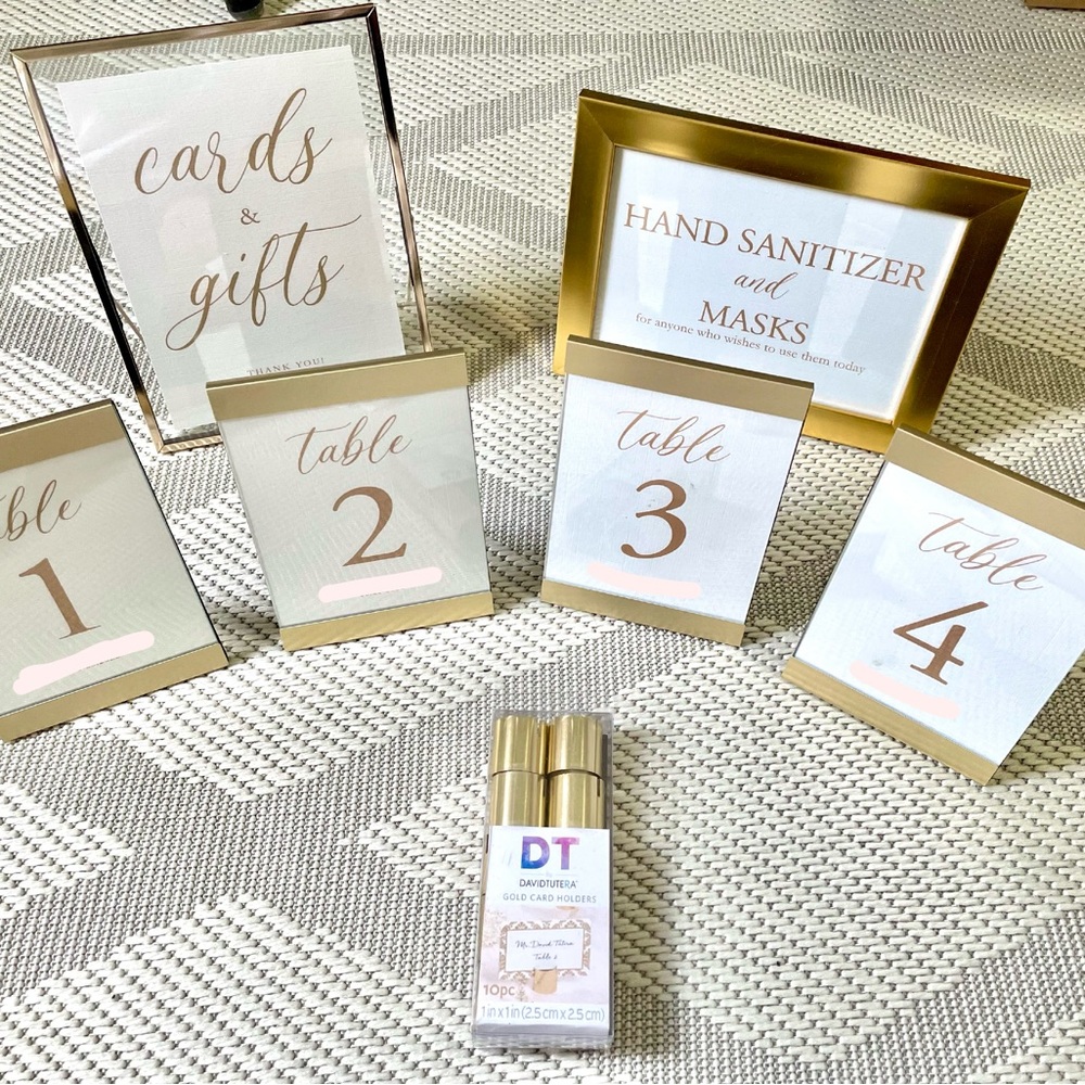 Gold frames for photos or wedding signage